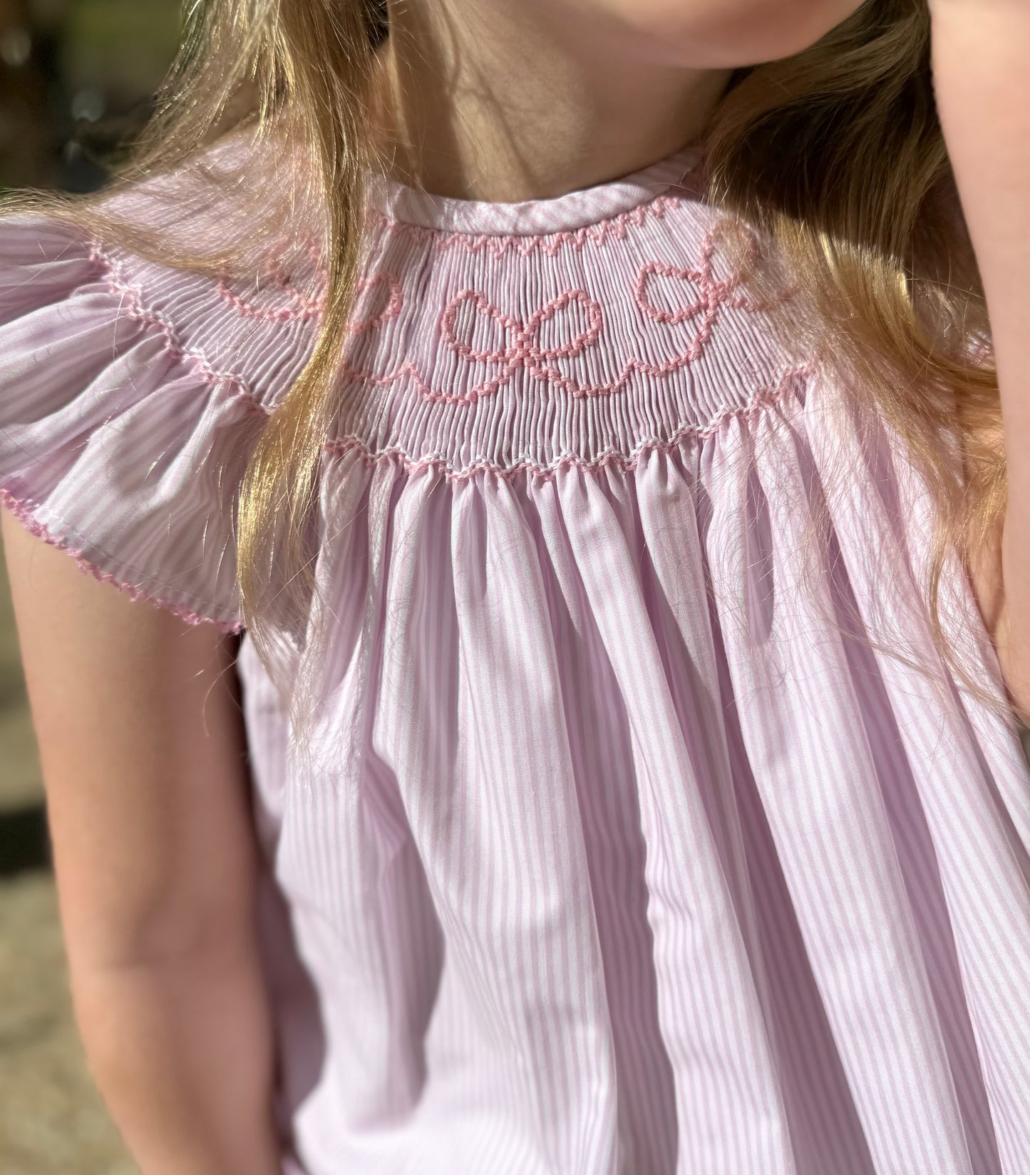 PINK BOWS SMOCKED DRESS